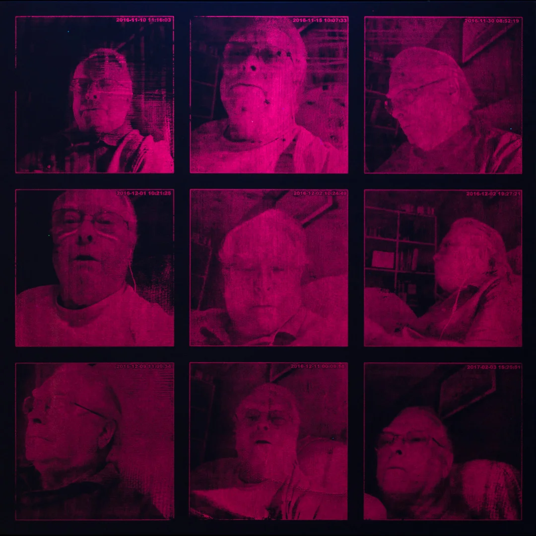 Magenta grid of webcam-derived portraits