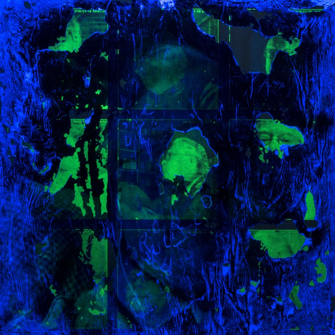 UV version of the obscured portrait with webcam stills and green text