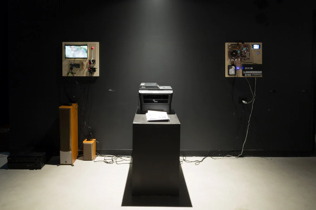 Technology installation with transceivers, printer, cables, and sound equipment