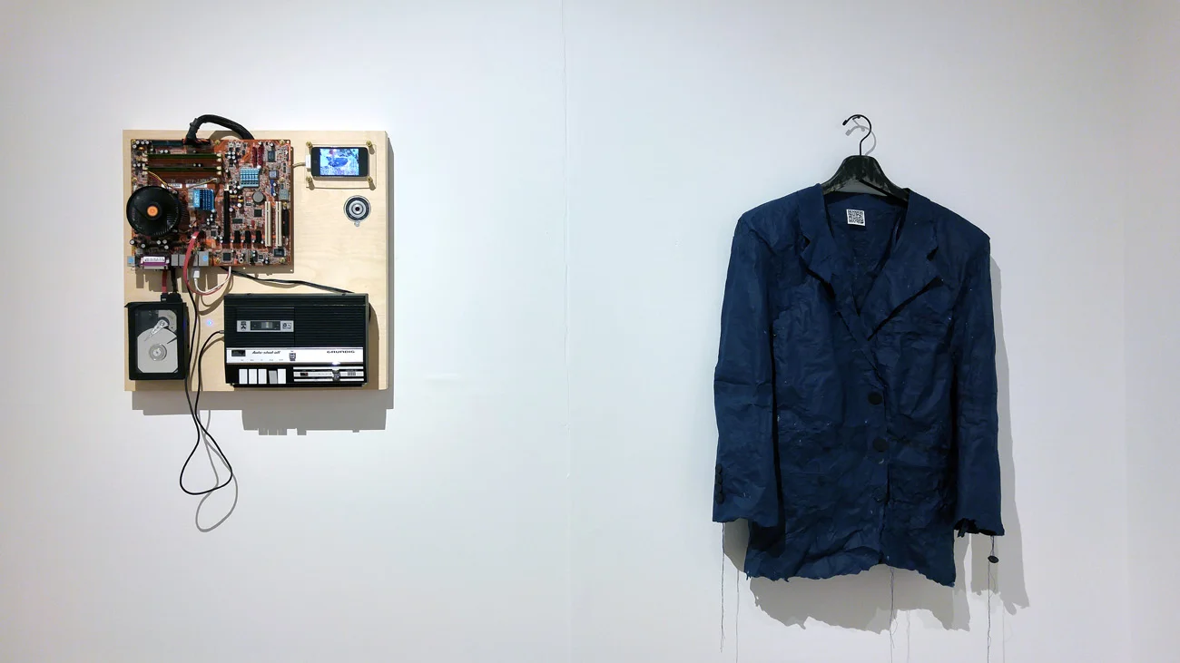 Custom electronics panel displayed beside a paper intelligence jacket